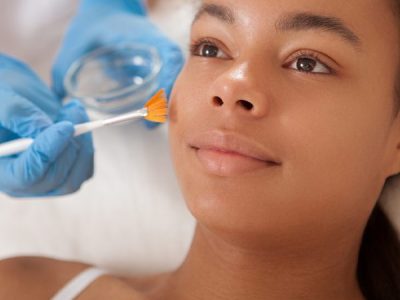 Dermatologist Giving A Patient A Facial
